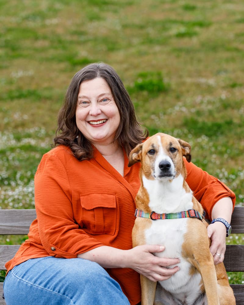 Samantha Scholefield, head-and-shoulders portrait outdoors.
